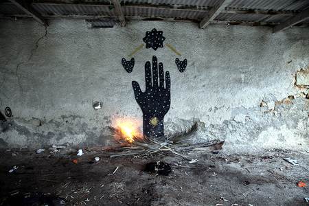 black athens greece hand fire thisisopium